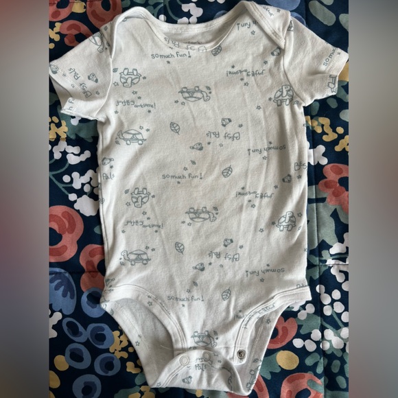 Carters turtle onesie. Color white and light gray with turtle print all around. - Picture 1 of 3